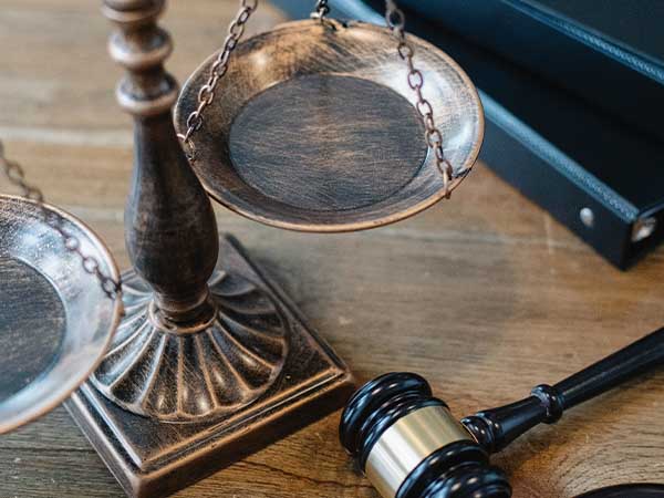 Scales of justice and a legal gavel